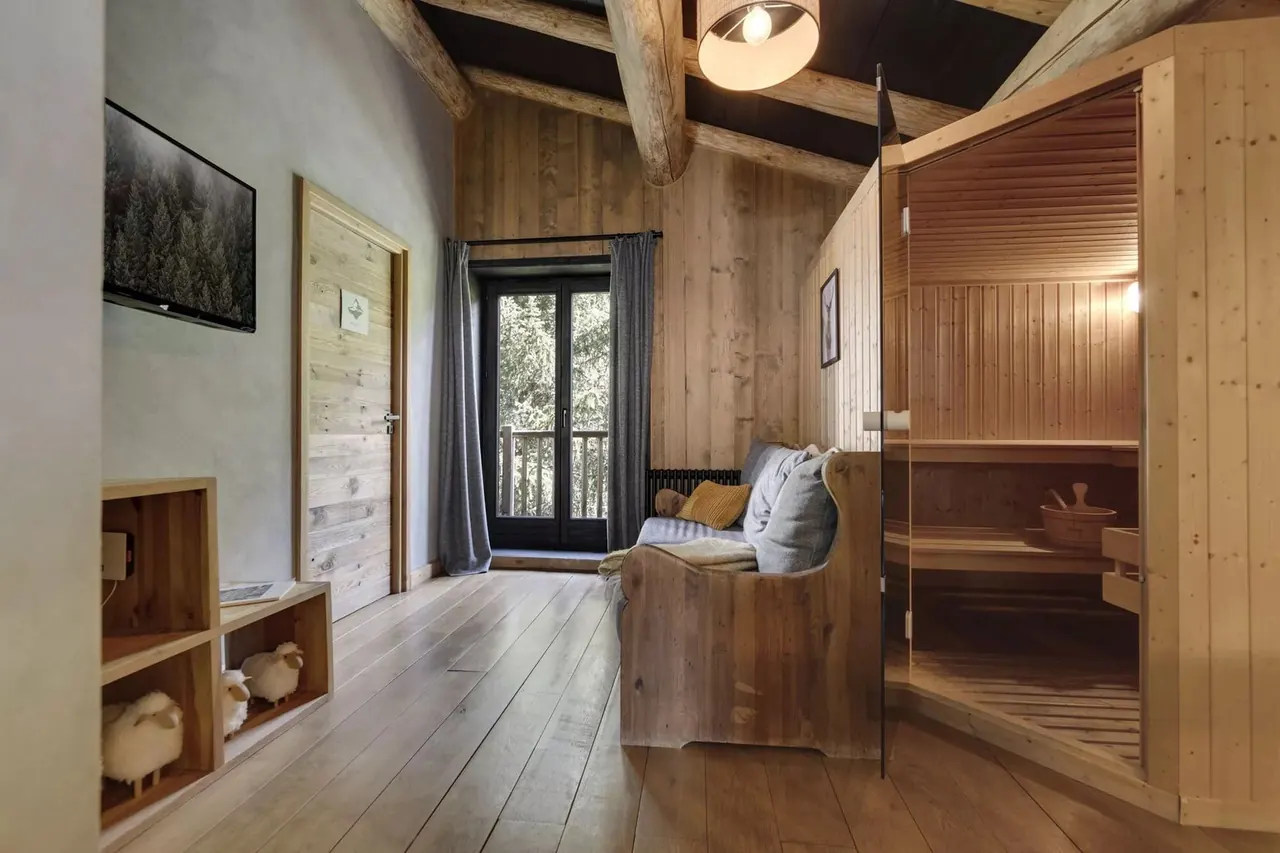 Cozy mountain chalet wellness lounge with a private sauna