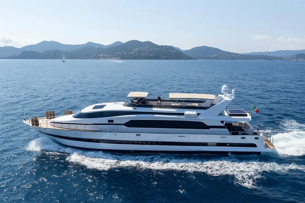 Motor yacht cruising along the French Riviera coastline